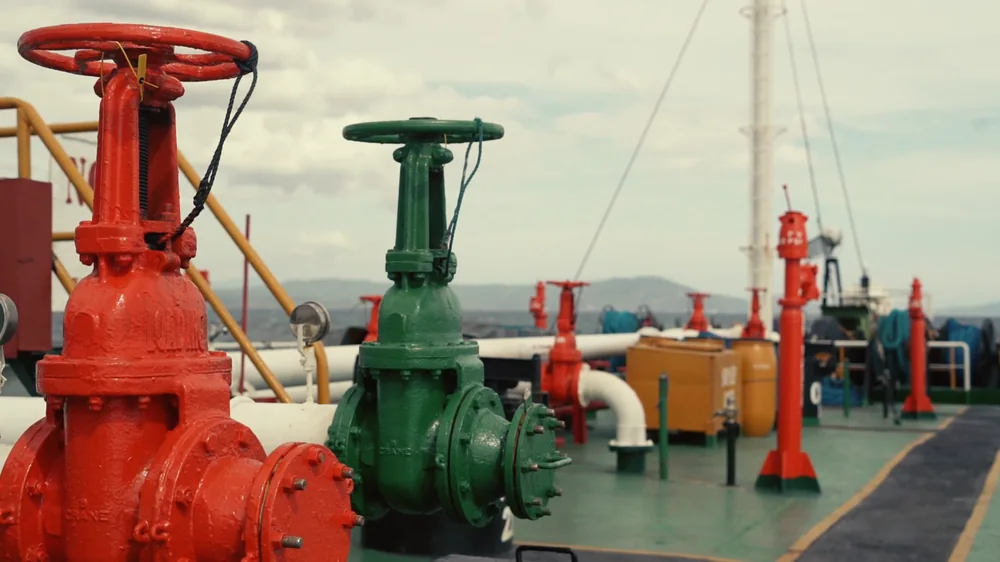 Cargo manifold valves on the deck of a PNL product tanker
